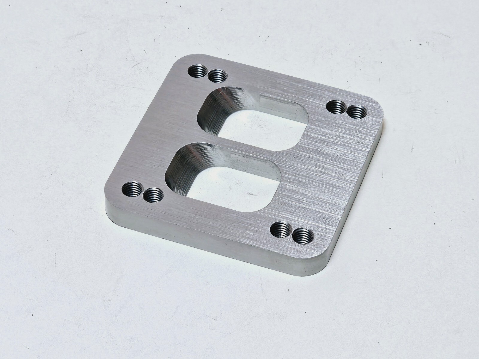 Offset T4 Divided Turbo Inlet Flange .400" Shift Spacer Twin Scroll Ports 1/2" - Image 2